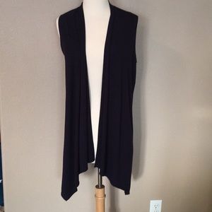 Navy blue sleeveless tunic length vest